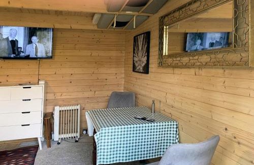Harnham Ski Chalet | Cosy Garden Log Cabin