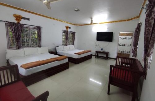 Valparai Hotel | COTTAGE GARDEN DEEPIKAS