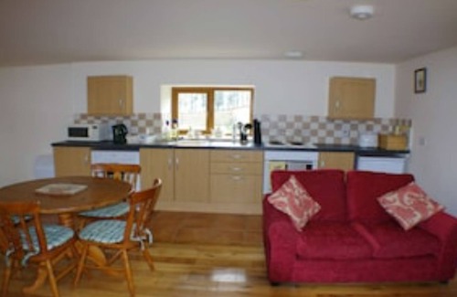 Tywyn Cottage | Cottage ISAF, A barn conversion comprising two semi-detached cottages