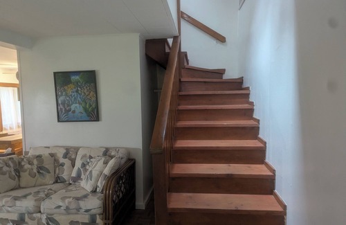 Harbert Cottage | cottage surrounded by field and woods, walking distance to beach
