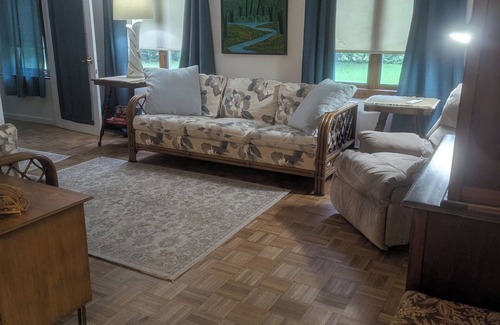 Harbert Cottage | cottage surrounded by field and woods, walking distance to beach