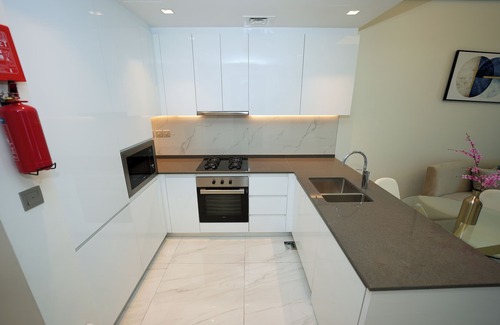 Dubai Sports City Apartment | Cozy 1BR Samana Golf Avenue wt Balcony