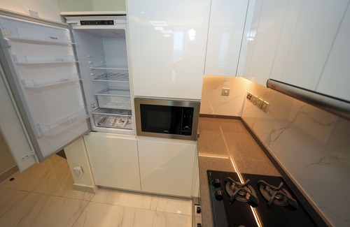 Dubai Sports City Apartment | Cozy 1BR Samana Golf Avenue wt Balcony