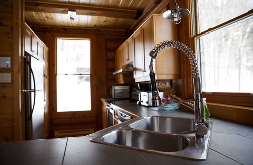 Lac Superieur Village Cabin | Cozy 8 person Log Cabin in Mont Tremblant w/hot tub and indoor fireplace