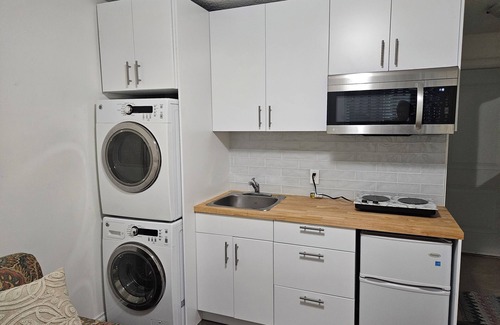 Langford House | Cozy and charming one-bedroom basement suite