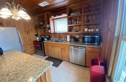 St. George Island Villa | Cozy and located in the center of the island close to local shops & restaurants!