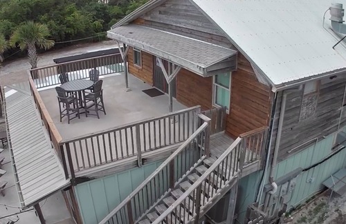 St. George Island Villa | Cozy and located in the center of the island close to local shops & restaurants!