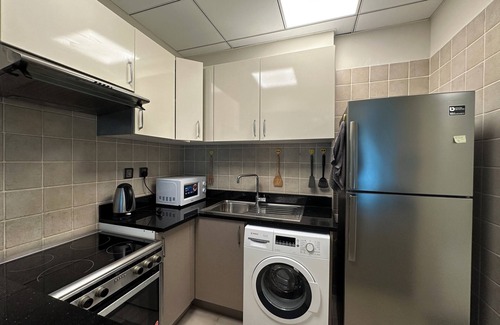 Nad Al Sheba Apartment | Cozy apartment with 1 bedroom and WiFi, in vibrant Dubai- Meydan
