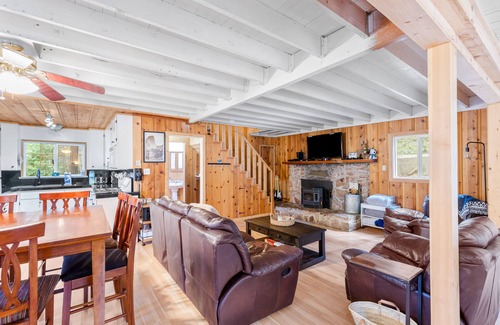 Arnold House | Cozy Blue Lake Springs cabin w/big trees, decks, game room, and private W/D