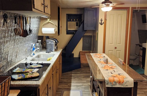 Grove Cabin | Cozy cabin in delightful Grove with boat dock and slip, WiFi, AC, and wood stove