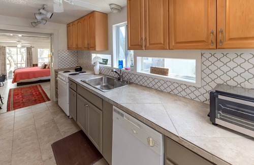 Yacht Harbor Cabin | Cozy Cabin on secluded cove with boat dock, walk to the water, lake views, cowboy pool