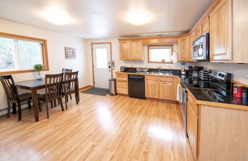 Huffman - O' Malley Cabin | Cozy Caribou Corner in peaceful wooded area, close to airport, trails, Sleeps 7!