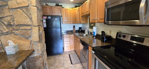 McHenry Villa | Cozy Condo- 3 bedroom lakefront condo with fireplace