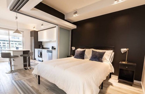 Kelowna Central Business District Condo | Cozy DT Condo Steps to the Beach!