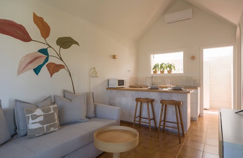 Maspalomas Ski Chalet | Cozy bungalow with large terrace overlooking the pool