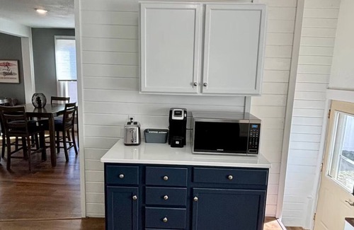Sioux Falls House | Cozy home near DT, Premier Center & Hospital- Foosball, 65"TV & Fenced Yard