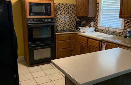 Schulenburg House | Cozy home with great landscaping and cute decor!