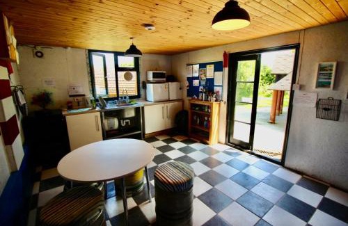 Bryngwran House | Cozy Hot Tent with Log Burner & Hot Tub Left Tent