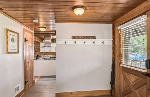 Chapin House | Cozy Lakefront Cabin w/ Gameroom + Hot Tub!