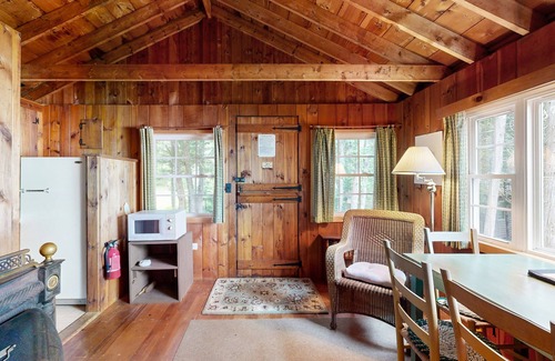Northport Cabin | Cozy Log Cabin with Deck & Picnic Table & Gorgeous Views
