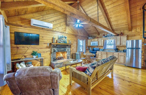 Saint Joe Cabin | Cozy, rustic Buffalo River log cabin with indoor/outdoor firepit. Sleeps 10!