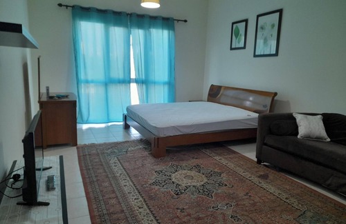 Jumeirah Village Triangle Apartment | Cozy studio with AC and WiFi in marvelous Dubai