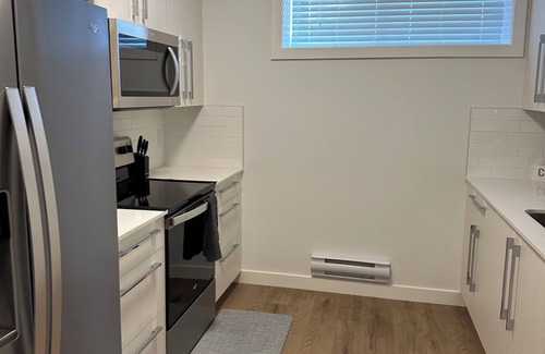 Northwest Calgary Bed & Breakfast | Cozy suite in Rangeview, 4 minutes to tons of amenities in Seton and Mahogany.