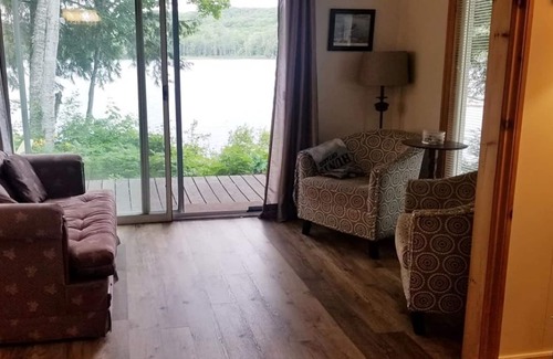 Novar Cottage | Cozy Sunset Cabin located lakeside in family friendly campground