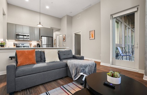 Downtown Minneapolis Apartment | CozySuites Marquee | pool, gym #11