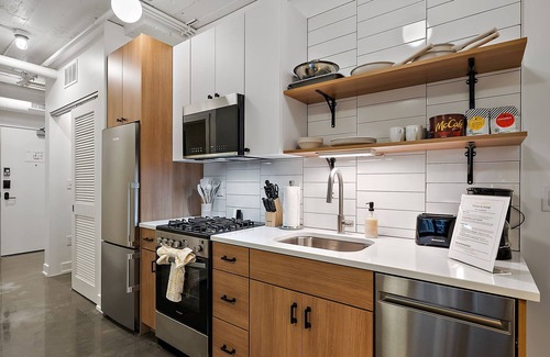 Warehouse District Apartment | CozySuites NLG w/pool, bowling alley, sauna #24