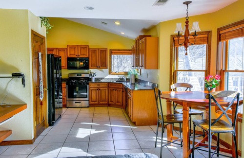 Whittier House | Creek-side home with private hot tub, game room, firepit, deck & mountain view