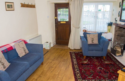 Exford House | Crown Cottage is a picture postcard thatched, self catering holiday cottage