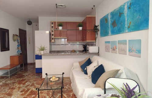 El Morche Apartment | Cupid Beach El Morche. Patio, Coast, Sea and Beach.