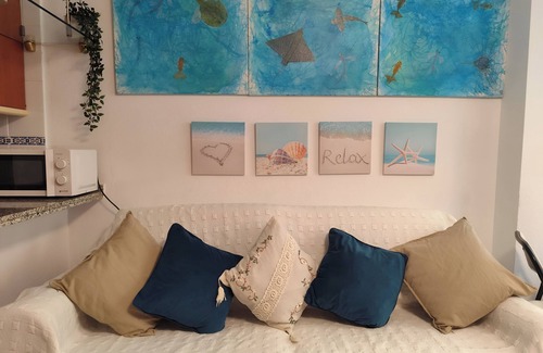 El Morche Apartment | Cupid Beach El Morche. Patio, Coast, Sea and Beach.