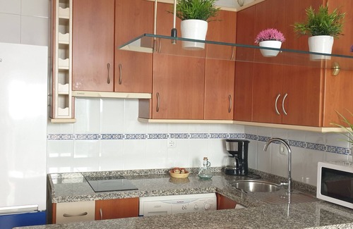 El Morche Apartment | Cupid Beach El Morche. Patio, Coast, Sea and Beach.