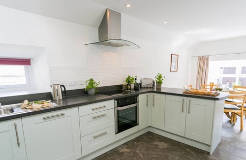 Holyhead Cottage | Cwt Drecs - an on the beach that sleeps 6 guests in 3 bedrooms