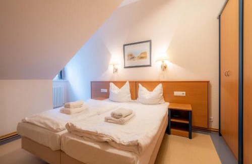 Binz Apartment | Dünenpark Binz - Klassik Ferienwohnung mit 1 Schlafzimmer und Balkon im Dachgeschoss 160