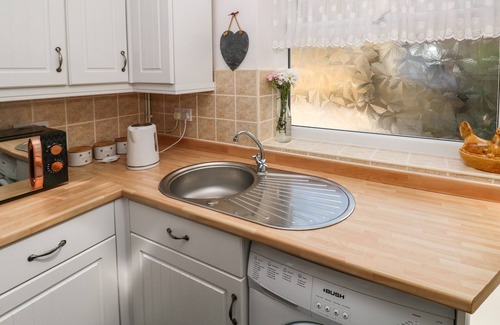 Pembrey Cottage | DAISYS COTTAGE, pet friendly, with a garden in Pembrey