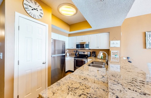 Miramar Beach Condo | dazzling oceanfront condo with pools, hot tub, balcony - steps from the sand