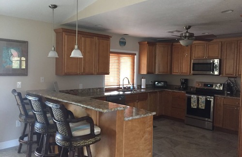 Little Torch Key House | Deep Water Corner Canal Lot with Heated Pool, Tiki Hut & 240' Dock