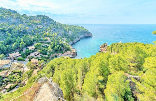 Deia Apartment | Deia tower overlooking the sea and it famous cove.