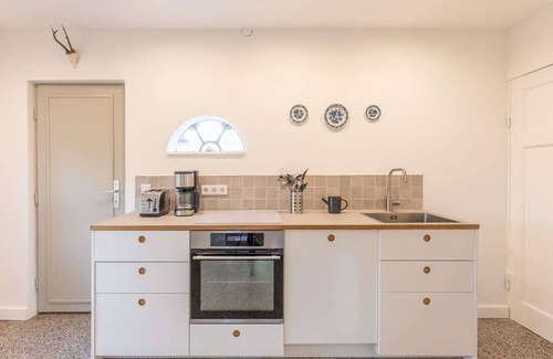 Tetenbull House | Deichwärterkate by Interhome