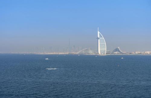 Palm Jumeirah Apartment | Dejaview Stays Luxury Apartment with Private Terrace, Burj & Sea View