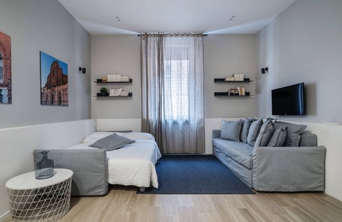 Historic Center Apartment | Delightful and bright studio located in the historic center of Bologna is able to accommodate up to 4 people and equipped with every comfort, you will feel yourself at home! The apartment is located in the center, where you can enjoy all the colors and f