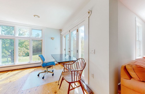 Jamaica House | Delightful updated farmhouse with original features, patio, and & W/D