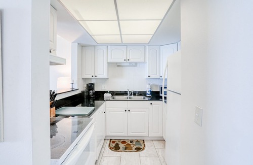 Indian Shores Condo | Delightful waterfront condo with sweeping views, beach access, balcony & pool