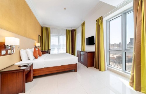 Deira Hotel | Deluxe One Bedroom Apartment Near Reef Mall By Luxury Bookings