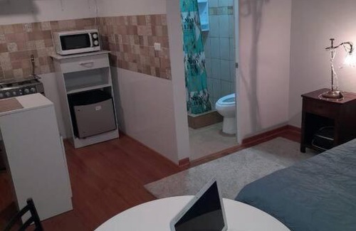 Downtown Santiago Apartment | Departamento interior en casa cultural