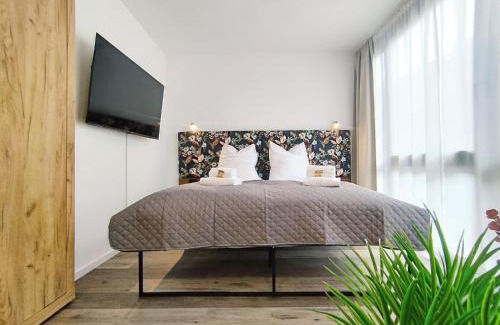 Mitte Apartment | Design Apartment für bis zu 4 im 2 OG, modern, Dachterrasse, Grill, ruhige Lage, Disney plus, Wii, LAN und WLAN