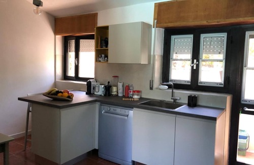 La Pelosa Villa | Design villa with a green roof a few steps from the sea